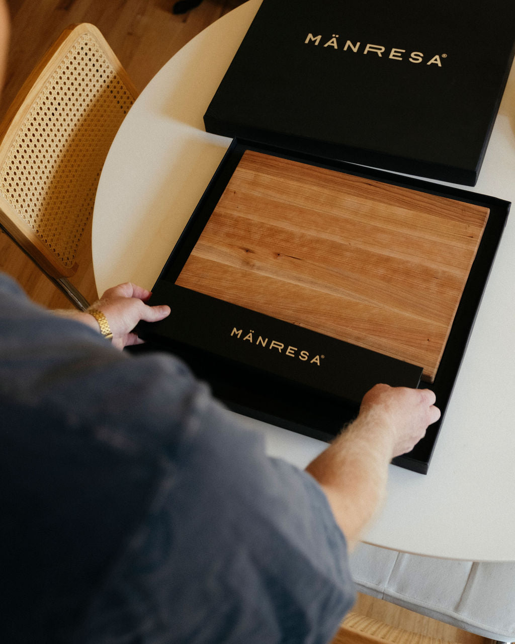 Appalachia Cherry butcher block chef knife gift set, chef knife box being placed in the gift box
