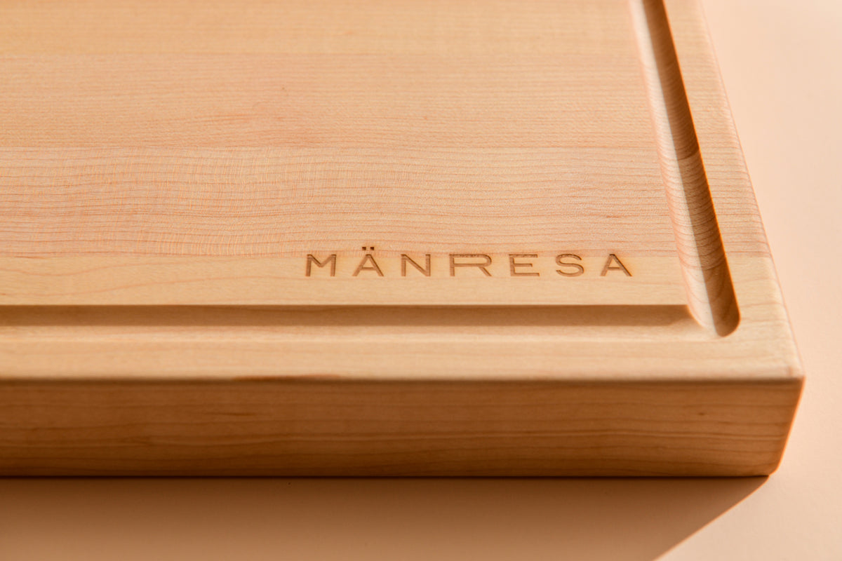 North Woods Maple butcher block - engraved logo close-up