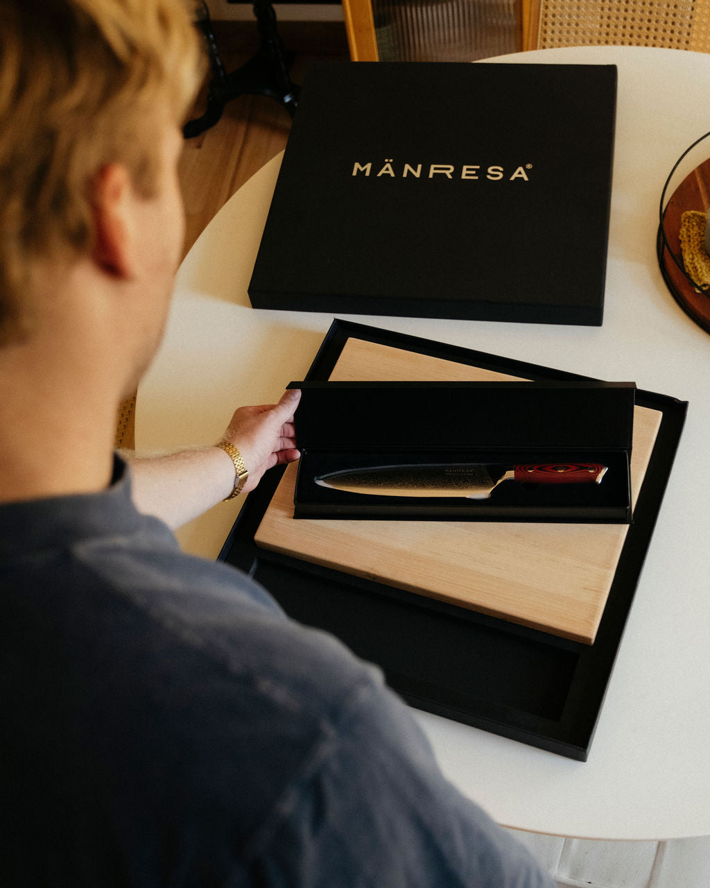 North Woods Maple butcher block with chef knife gift set, lifestyle unboxing view